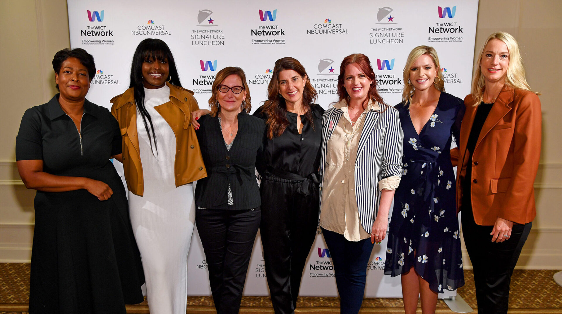NEW YORK, NEW YORK - APRIL 14: (L-R) Dawn Porter, Aja Evans, Nicole Newnham, Laura Gentile, Allison Glock, Kathryn Tappen, and Jen Neal attend The WICT Network Signature Luncheon at The Plaza on April 14, 2022 in New York City. (Photo by L. Busacca/Getty Images for The WICT Network)
